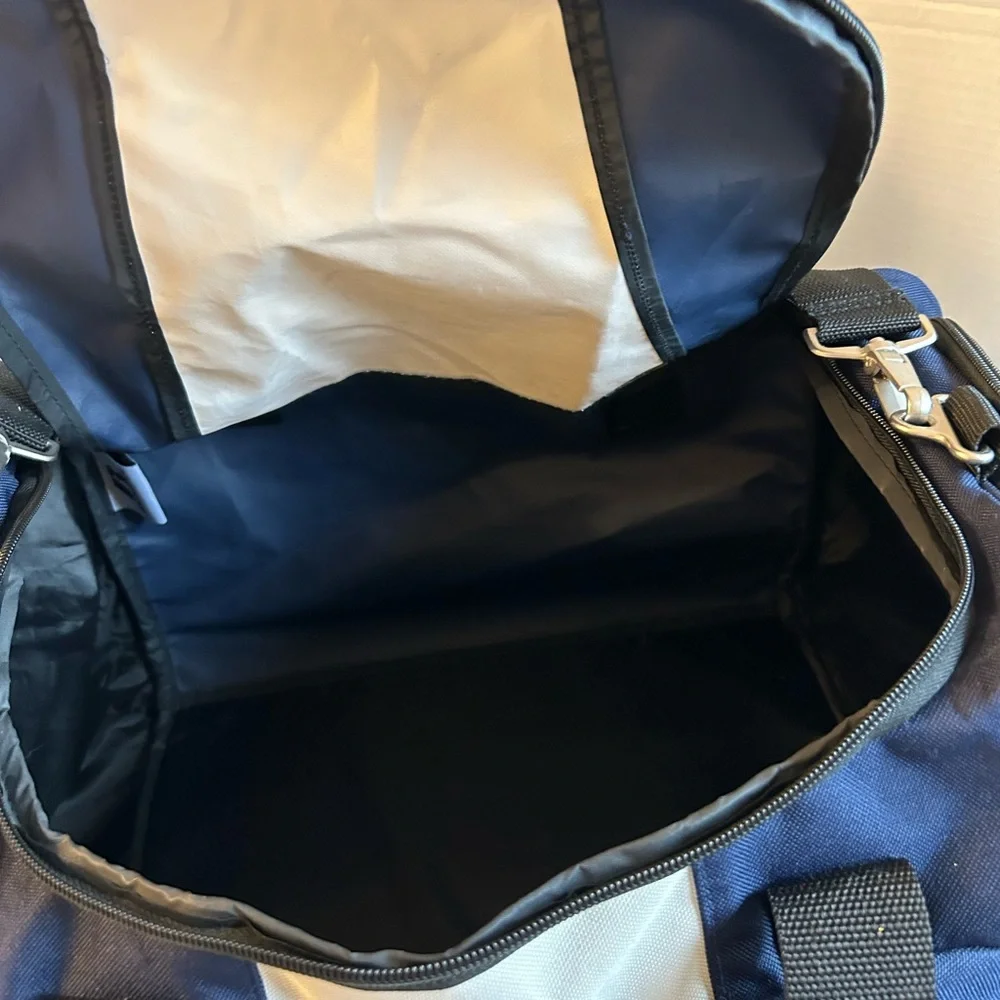 RUSSELL EXCLUSIVELY DISTRIBUTED BY PREMIUM BAGS,LLC LOGO NCCA FINAL FOUR DUFFEL